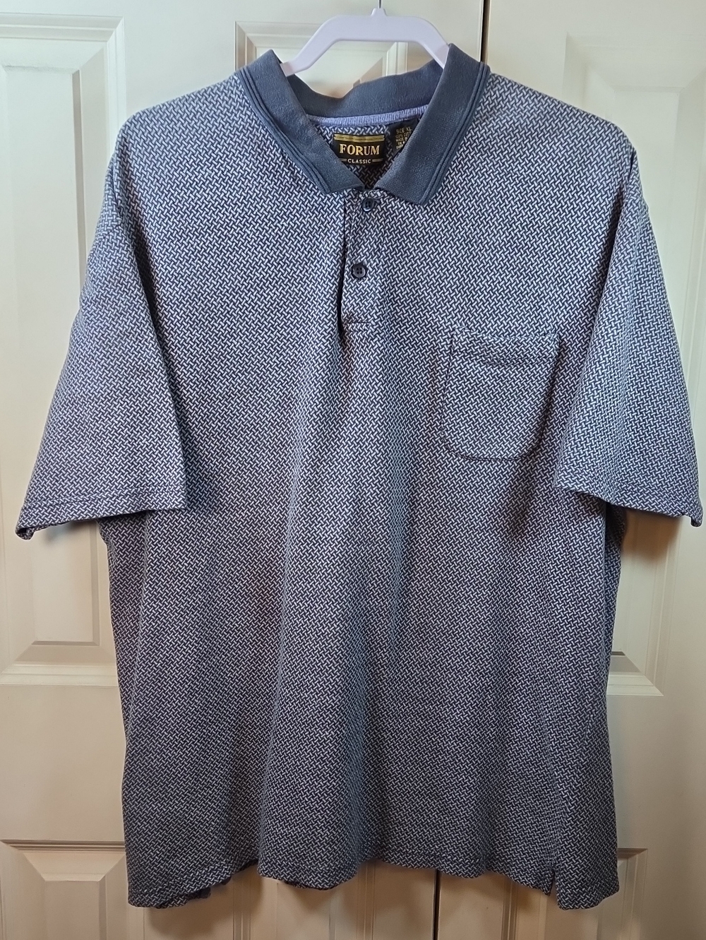 Classic Men's Blue Micro-Pattern Polo with Chest Pocket